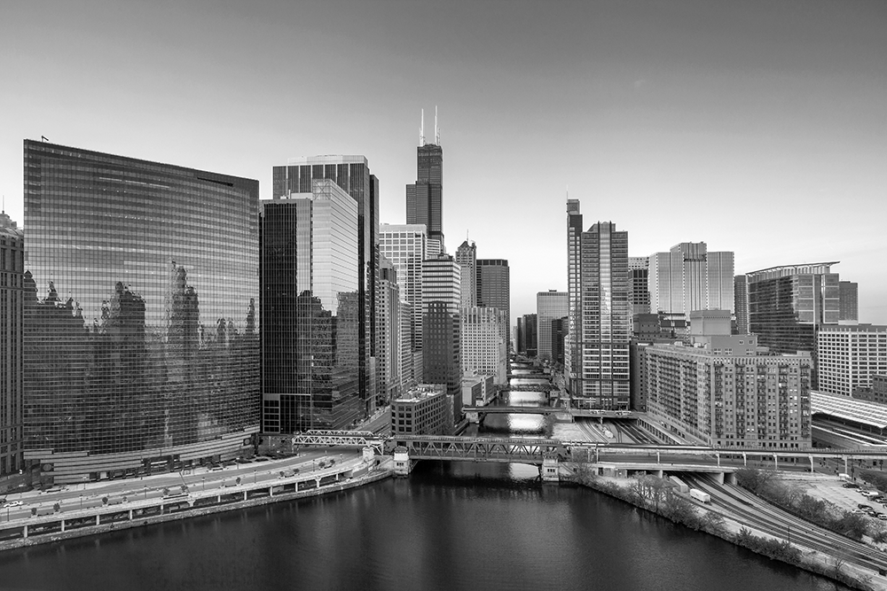 Chicago cityscape image of Chicago downtown at sunrise, in black and white